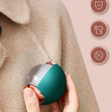 Clothes fluff removal roller ball